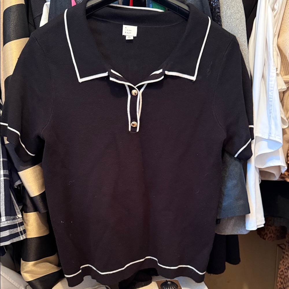a new day Black Polo Top with White Label Detail